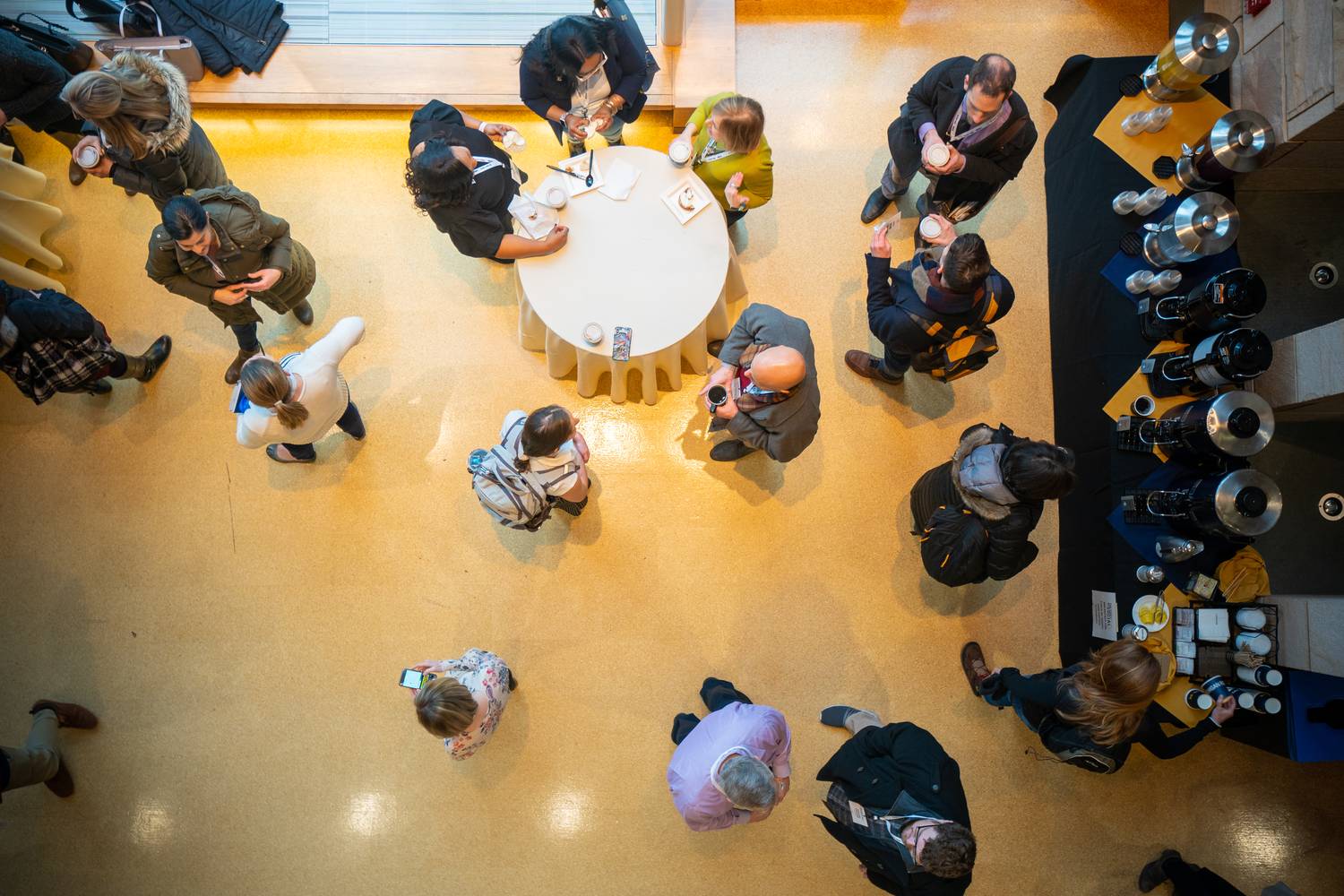 Aerial view of guests mingling at a conference networking event