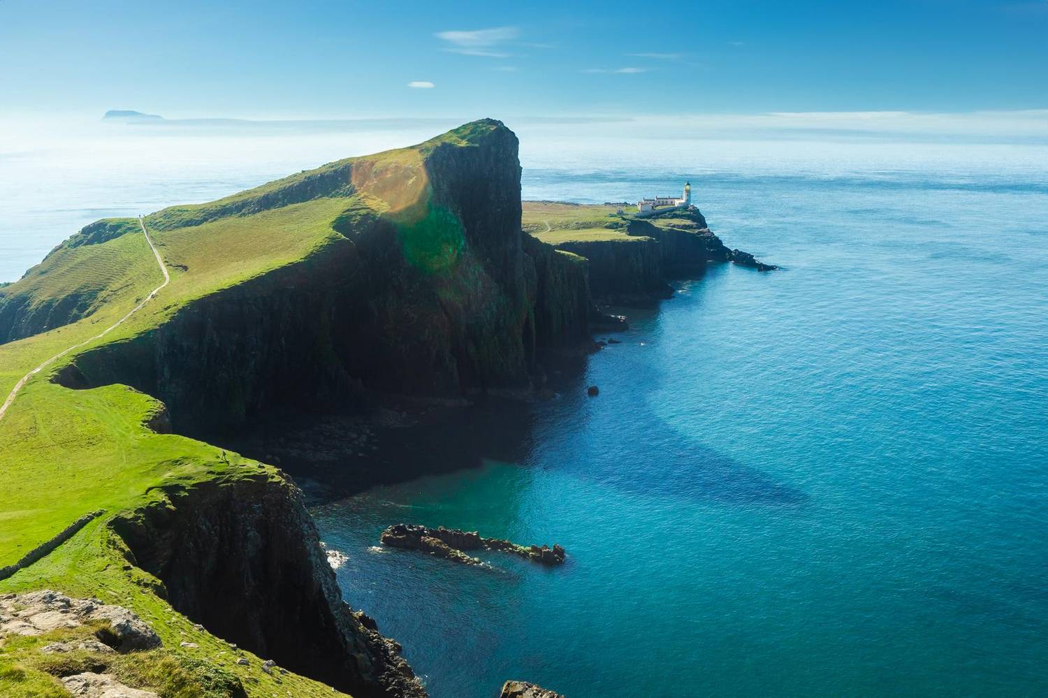 Lighthouse on coastal cliffs